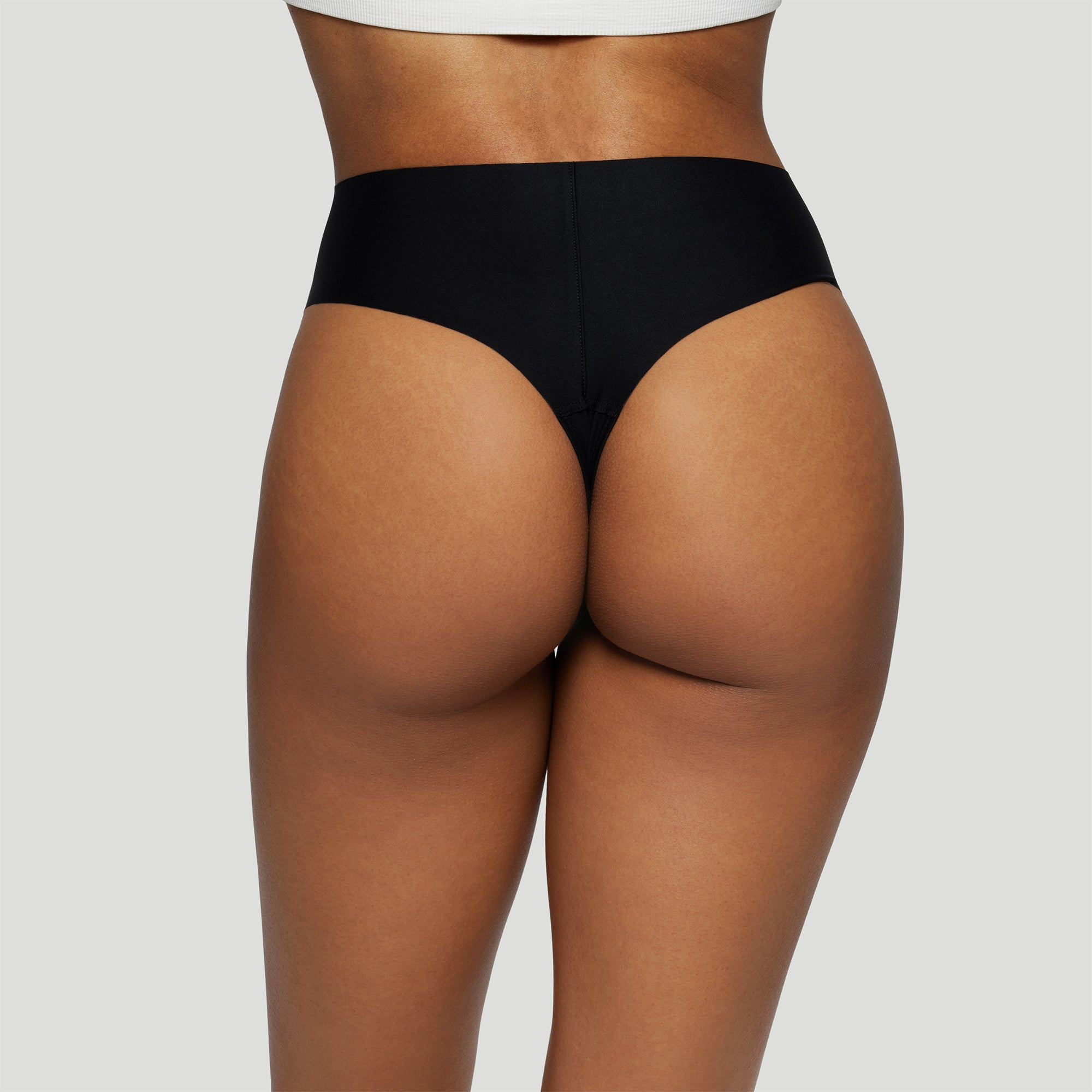 JIV ATHLETICS The Cameltoe Proof High Rise Thong in Black